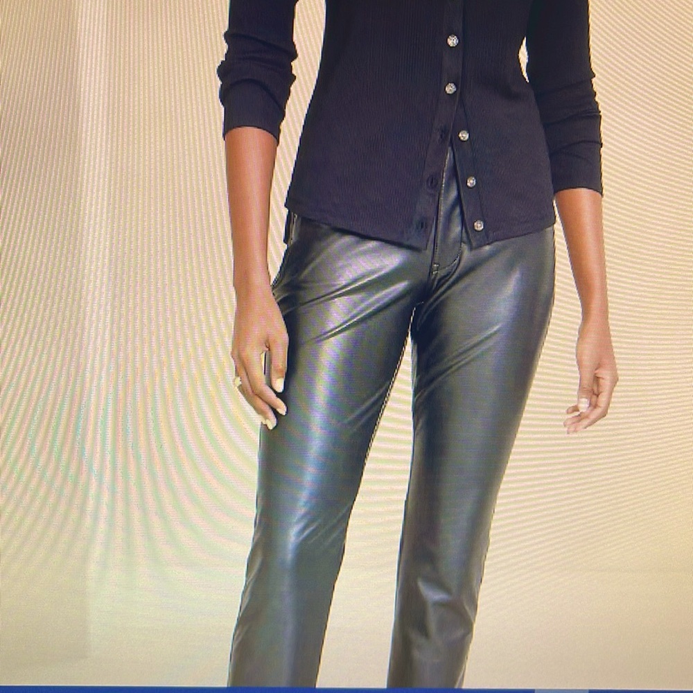 Vegan leather, soft and smooth. Full length, pant button and zipper fully lined.